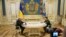 FILE - U.S. Special Envoy for Ukraine and Russia Keith Kellogg, left, and Ukraine's President Volodymyr Zelenskyy talk during their meeting in Kyiv, Feb. 20, 2025.