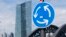 FILE - A traffic sign stands next to the headquarters of the European Central Bank in Frankfurt, Germany, June 16, 2015.