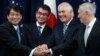 From left, Japanese Defense Minister Itsunori Onodera, Japanese Foreign Minister Taro Kono, Secretary of State Rex Tillerson and Defense Secretary James Mattis shake hands "ASEAN style" at the start of a Security Consultative Committee meeting at the State Department in Washington, Aug. 17, 2017.