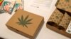 FILE - Cannabis product boxes are displayed at The Cannabis World Congress & Business Exposition (CWCBExpo) trade show in New York City, New York, May 30, 2019.