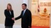 Rhona Smith, left, U.N. special rapporteur on the situation of human rights in Cambodia, poses with Cambodian Prime Minister Hun Sen, for a photo during a meeting at Peace Palace, in Phnom Penh, Cambodia, Monday, Sept. 21, 2015. 