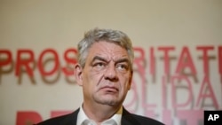 Romanian Prime Minister Mihai Tudose, speaks during a press conference, following a six-hour meeting of the ruling Social Democratic Party in Bucharest, Oct. 12, 2017. 