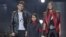 In this Oct. 8, 2011 file photo, from left, Prince Jackson, Prince Michael II "Blanket"Jackson and Paris Jackson arrive on stage at the Michael Forever the Tribute Concert, at the Millennium Stadium in Cardiff, Wales.