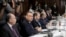 Venezuelan opposition legislator Enrique Marquez (2nd L) sits alongside his colleagues at the Ministry of Foreign Affairs before taking part in negotiations aimed at resolving Venezuela's ongoing economic and political crisis, in Santo Domingo, Dominican Republic, Dec. 1, 2017.
