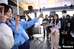 Jo Yoong-jae and Choi Seo-eun, participants in Single's Inferno 2, attend a fan meeting event, in Seoul