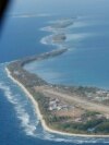 FILE - Funafuti, the main island of the nation state of Tuvalu, is photographed from a Royal New Zealand airforce C130 aircraft as it approaches the tiny South Pacific nation.
