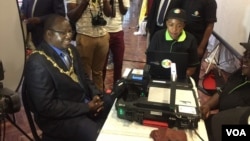 One of the people who registered to vote using Biometric Voter Registration kits supplied by a Chinese Company.