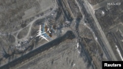 A satellite image shows bomber in flight at northeast of Engels Air Base in Saratov