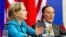 US Secretary of State Hillary Clinton speaks alongside Chinese Vice-Premier Wang Qishan (R) during a signing ceremony in Beijing, 25 May 2010