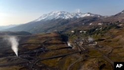 FILE - An aerial view shows the Mutnovskaya geothermal power plant in Russia's far east Kamchatka Peninsula region on Sept. 16, 2021. Authorities reported on Aug. 31, 2024, that a helicopter with 22 people aboard has gone missing in the region.