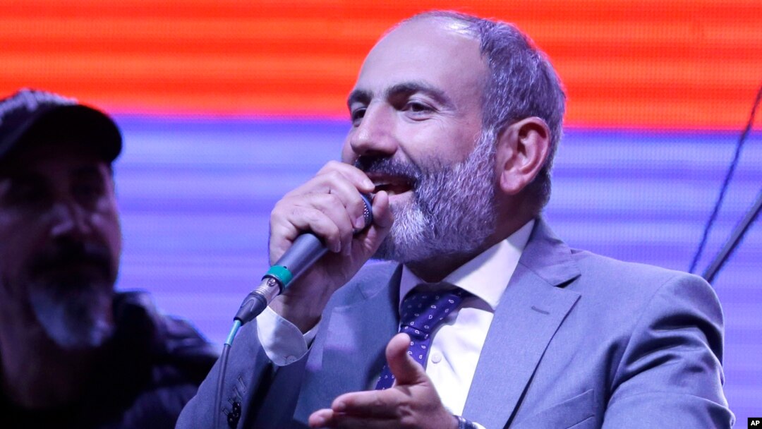 Opposition lawmaker Nikol Pashinian addresses the crowd gathered in Republic Square during a concert in Yerevan, Armenia, May 7, 2018.