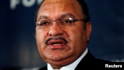 Incumbent Peter O'Neill has been re-elected as prime minister of Papua New Guinea, following the weeks-long election process because of poor organization and accusations by opposition candidates of vote rigging. 