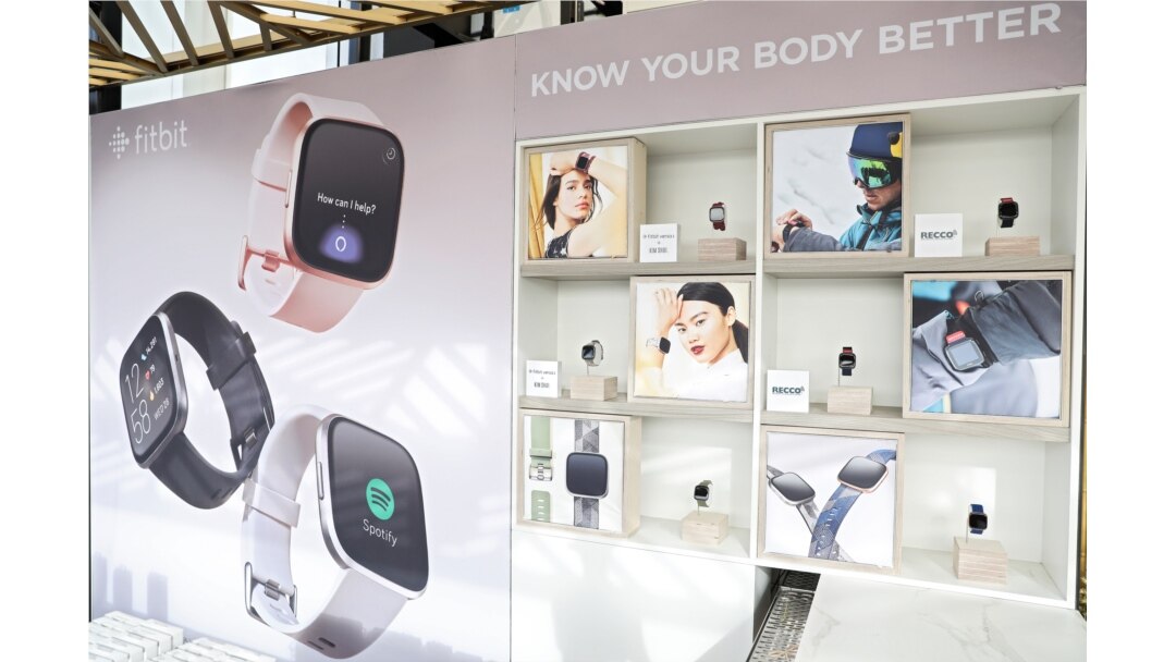 FILE - Fitbit devices and software include Fitbit Premium, various sleep tools, Fitbit Versa 2 smartwatch with Amazon Alexa Built-in, and its Aria Air smart scale, Aug. 27, 2019.
