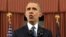 President Barack Obama addresses the nation from the Oval Office at the White House in Washington, Dec. 6, 2016. 