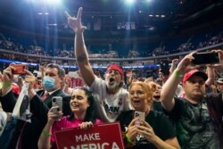 Supporters of President Donald Trump cheer as he arrives on stage to speak to a campaign rally at the BOK Center, June 20, 2020, in Tulsa, Oklahoma.