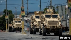 Pasukan kepolisian Kenya berpatroli di Port-au-Prince, Haiti, pada 4 September 2024. (Foto: Reuters/Ralph Tedy Erol)