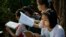 Students prepare for an exam in suburbs of Yangon, Myanmar, February 2016.