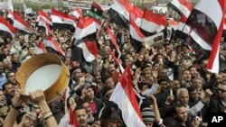 Thousands of Egyptians shout slogans as they gather at Tahrir Square, the focal point of the Egyptian uprising, in Cairo, Egypt, February 25, 2011