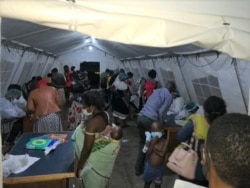 FILE - Malawi returnees screened at Mwanza border upon arrival from South Africa. (Courtesy: Pasqually Zulu/Immigration Departmentment)