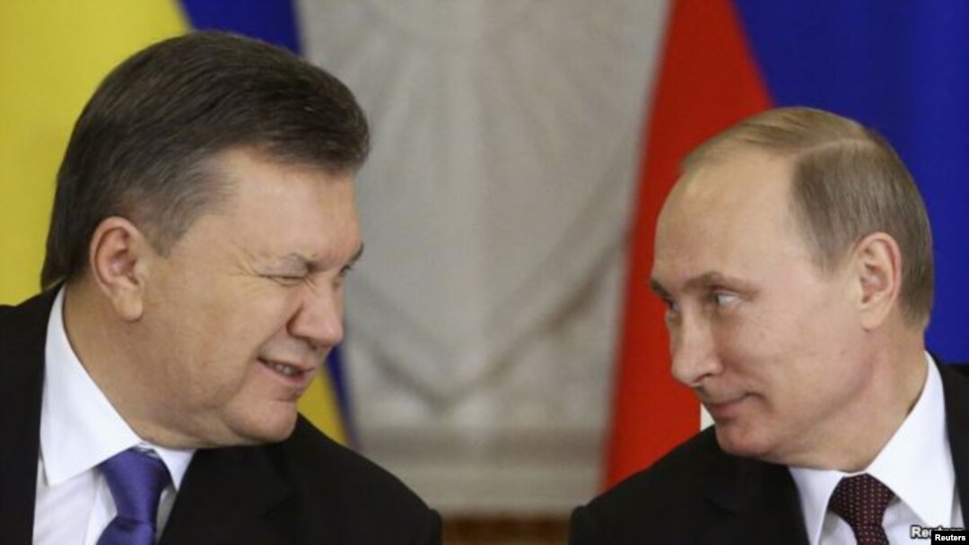 Mantan Presiden Ukraina, Viktor Yanukovych (kiri) dan Presiden Rusia Vladimir Putin (foto: dok).