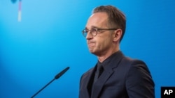 German Foreign Minister Heiko Maas attends a press conference at the Foreign Ministry in Berlin.