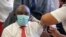 South African President Cyril Ramaphosa receives the Johnson and Johnson coronavirus disease vaccination at the Khayelitsha Hospital near Cape Town, South Africa, Feb. 17, 2021.