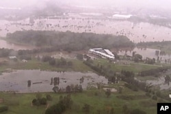 This image from a video, shows flooded fields on Gold Coast, Australia, Jan. 18, 2020.