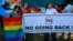 A group of Indian activists hold a banner against section 377 of the Indian Penal Code that criminalizes homosexuality during a protest in Mumbai, India, Dec. 11, 2013.