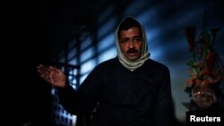 Delhi's Chief Minister Arvind Kejriwal, chief of the Aam Aadmi Party, speaks during an interview with Reuters at his residence on the outskirts of New Delhi, Jan. 27, 2014.