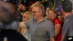 Australian Prime Minister Anthony Albanese marches in the 45th Anniversary Sydney Gay and Lesbian Mardi Gras Parade in Oxford Street, Sydney, Australia, Feb. 25, 2023.