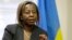 Rwandan Foreign Minister Louise Mushikiwabo gestures during an interview with The Associated Press at the Rwandan Embassy in Washington, (File photo).