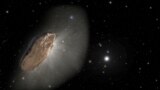 This artist's illustration shows the wayward interstellar visitor 'Oumuamua (pronounced oh-MOO-ah-MOO-ah) racing toward the outskirts of our solar system. (NASA, ESA and Joseph Olmsted and Frank Summers of STScI/Handout via REUTERS)