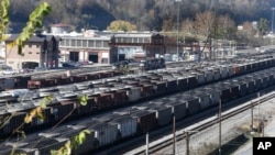 FILE - Coal cars fill a rail yard in Williamson, W. Va., Nov. 11, 2016. 