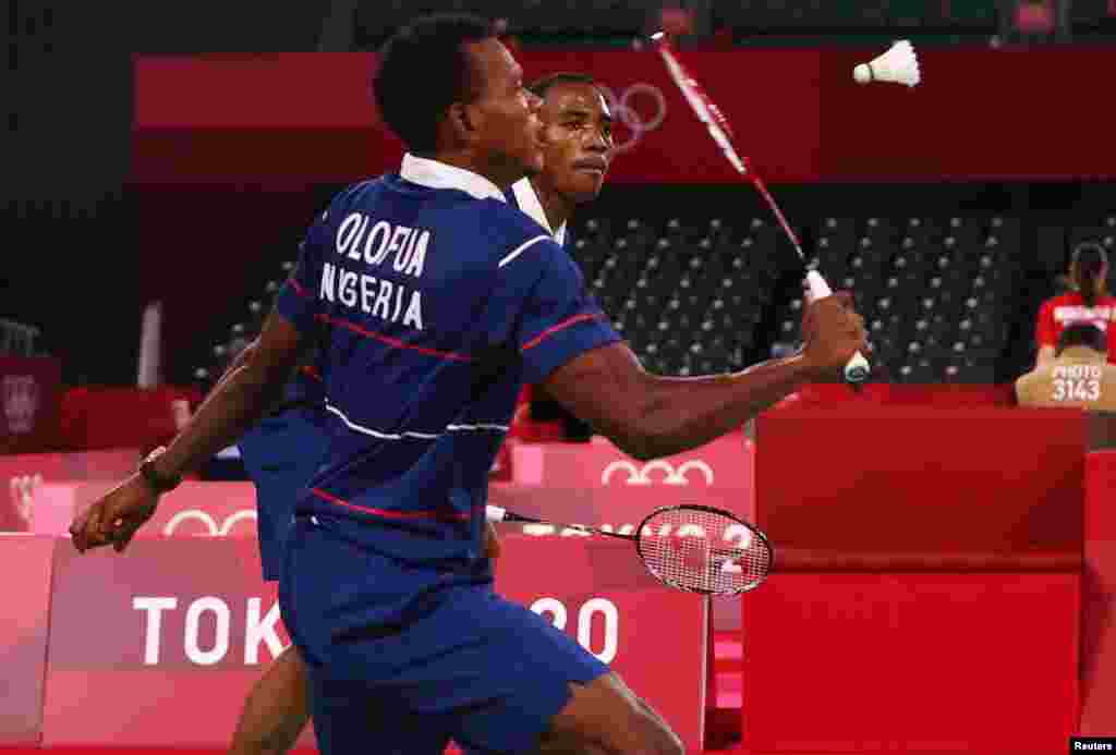 Godwin Olofua of Nigeria in action next to Anuoluwapo Opeyori of Nigeria during the match against Vladimir Ivanov of the Russian Olympic Committee and Ivan Sozonov of the Russian Olympic Committee. REUTERS/Leonhard Foeger