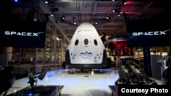 FILE - The Dragon spacecraft is seen in this photo provided by SpaceX.