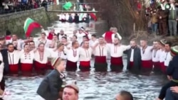 Bulgarians Dance in Icy Waters on Epiphany Day