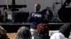 Alderman Sean Mosley, a member of Alpha Phi Alpha, speaks at a Souls to the Polls voting rally at Grace Baptist Church on Oct. 26, 2024, in Waterbury, Conn. 