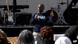 Alderman Sean Mosley, a member of Alpha Phi Alpha, speaks at a Souls to the Polls voting rally at Grace Baptist Church on Oct. 26, 2024, in Waterbury, Conn. 