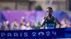 Ethiopia's Tamirat Tola approaches the finish line to win the men's marathon at the 2024 Summer Olympics on Aug. 10, 2024, in Paris. Tola collected Ethiopia's only gold medal.