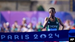 Ethiopia's Tamirat Tola approaches the finish line to win the men's marathon at the 2024 Summer Olympics on Aug. 10, 2024, in Paris. Tola collected Ethiopia's only gold medal.