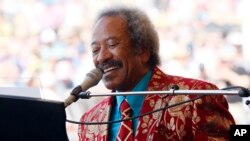 FILE - Allen Toussaint performs at the New Orleans Jazz and Heritage Festival in New Orleans, Louisiana, May 7, 2011. 