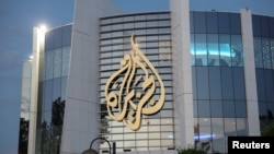 FILE - An Al Jazeera building in Doha, Qatar, May 5, 2024.