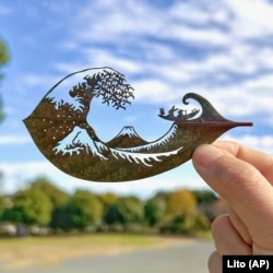 This photo provided by Japanese artist Lito shows his work titled "Thirty-six Views of Mt. Fuji: The Great Wave off Kanagawa." (Lito via AP)