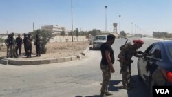 SDF Fighters trying to prevent an ISIS breakout in Hasaka prison