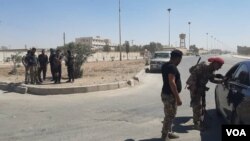 Para kombatan Pasukan Demokratik Suriah SDF Fighters trying to prevent an ISIS breakout in Hasaka prison