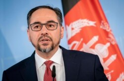 Foreign Minister of Afghanistan Salahuddin Rabbani talks to the media at a press conference in Berlin, June 28, 2019.