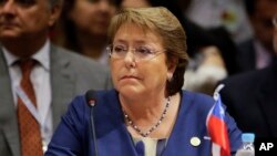 FILE - Chile's President Michelle Bachelet attends the Mercosur Summit in Luque, Paraguay, Dec. 21, 2015.