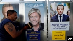 Des affiches de candidats lors de la campagne électorale en France, le 14 avril 2017. (Reuters / Eric Gaillard)