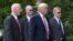 President Donald Trump, his longtime bodyguard Keith Schiller, left, and two Secret Service agents walk along the South Lawn of the White House in Washington, June 12, 2017.