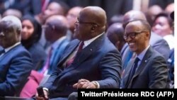 Président Paul Kagame ya Rwanda (g) na mokokani wa ye ya RDC, Félix Tshisekedi, na African CEO Forum, na Kigali, Rwanda, 25 mars 2019. (Twitter/Présidence RDC)